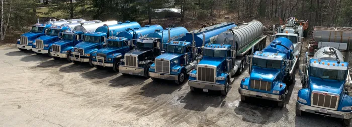 The full Rosano Davis fleet of septic pumping trucks